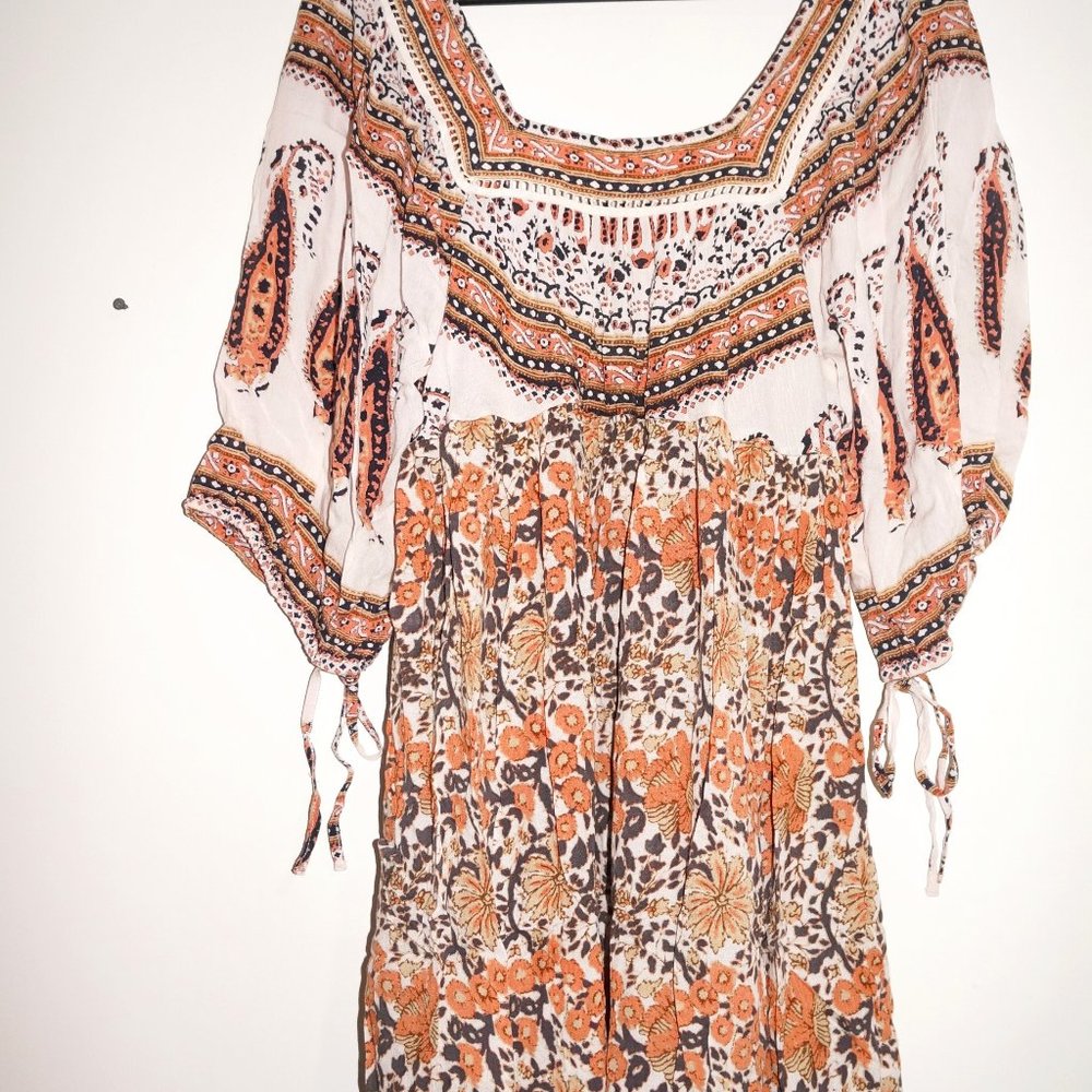 Free swinging brown mini dress by Free people